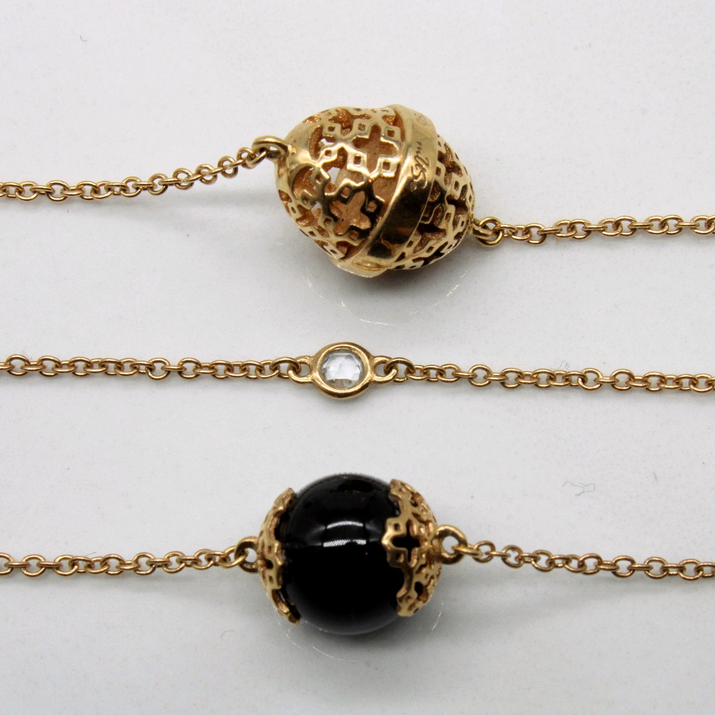 Birks' Onyx & White Sapphire Bead Necklace | 28.00ctw, 0.35ctw | 44 |